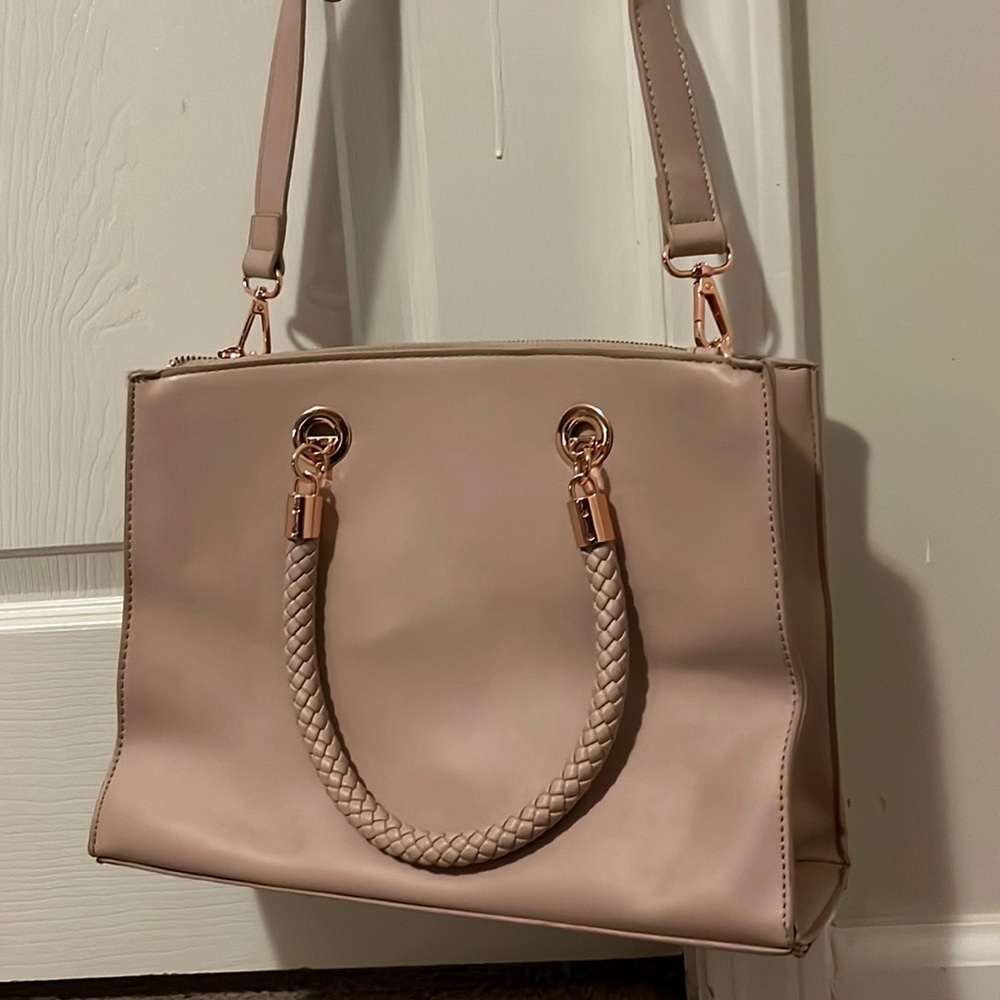 Charlotte Tillbury, rose pink medium sized purse.